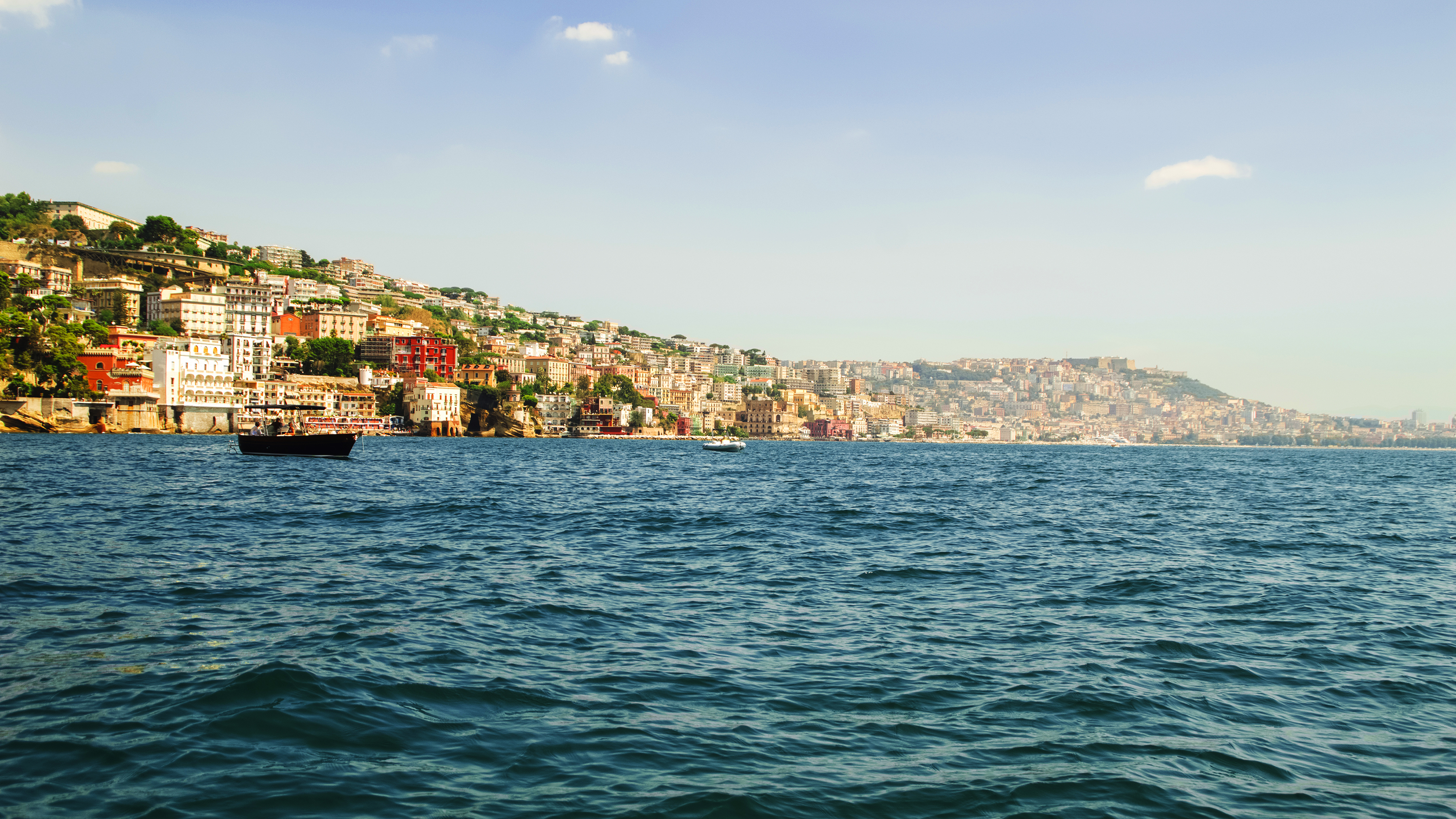 view-from-the-sea-of-posillipo-hill-naples-and-the-blue-waters-2