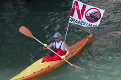 Protester against cruise ships in Venice on kayak in lagoon